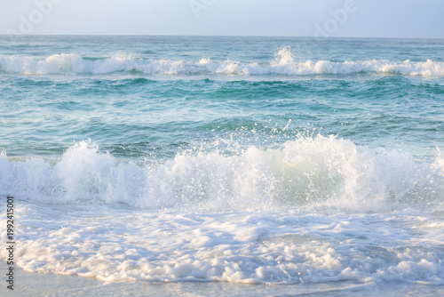 Fotografia Sunrise at Navarre Beach Florida Shows Waves Breaking on the Shore