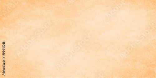 Elegant peach-colored textured surface, a soft and inviting backdrop.