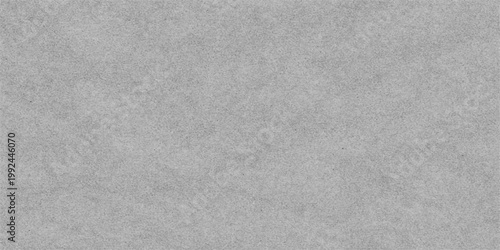 Subtle textural details dance across the monochrome surface. The scene invites viewers to appreciate the nuanced variations in tonality. 