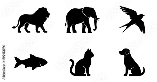 Set of animal silhouettes including lion, elephant, bird, fish, cat, and dog