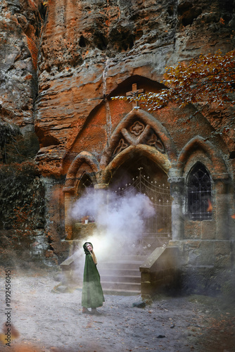 Magical medieval fantasy scene, stone arch entrance with fog, autumn leaves, and mysterious cloaked traveler