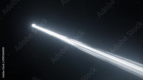 A long cylindrical device emitting a concentrated beam of white light, floating in a starfield