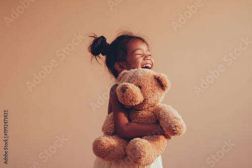 joyful boy laughs heartily as playful puppy licks his face in sunny outdoor setting