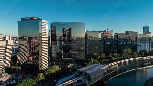 фотографія Aerial view of Pinheiros River and Berrini financial district skyscrapers at sun