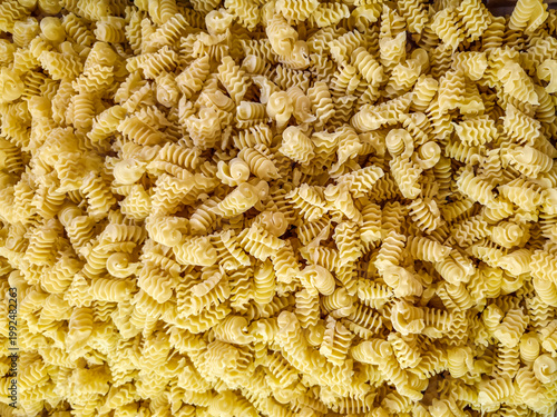 A tray of fresh made radiatore pasta just from the pasta machine
