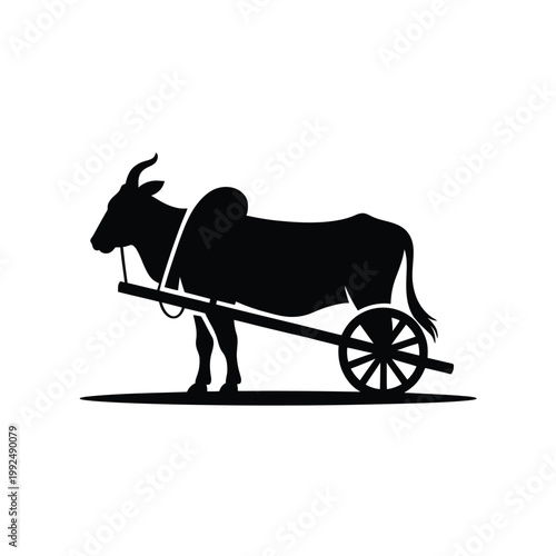 Black silhouette of a bull pulling a simple wooden cart on ground