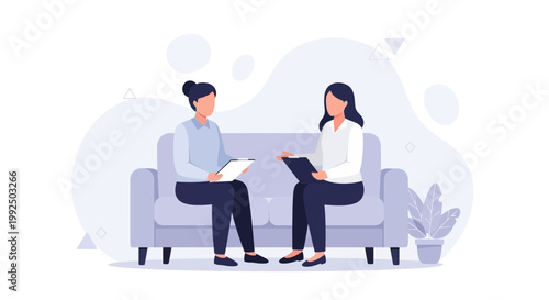 Two women in a therapy session, discussing issues on a couch.