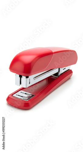 Red stapler on white background