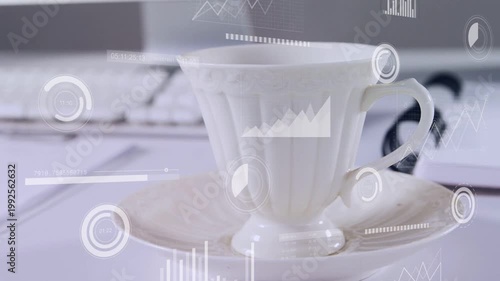 Teacup centered on desk during launch, HUD graphics animating around cup, showing tech dashboard