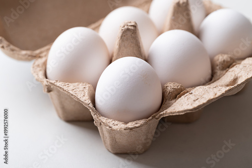 Fotografia Organic white leghorn eggs from free range farm in egg carton