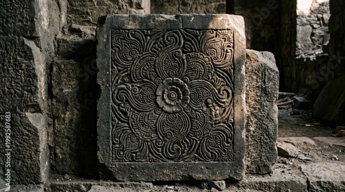 Intricate Stone Carving with Floral Patterns in Ancient Ruins