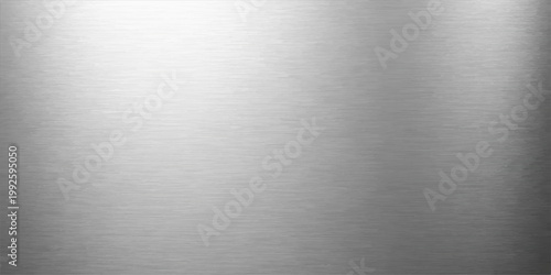 A shiny stainless steel plate with a brushed aluminum texture creates an industrial gray metallic surface pattern for use as a professional chrome alloy backdrop or silver sheet wallpaper