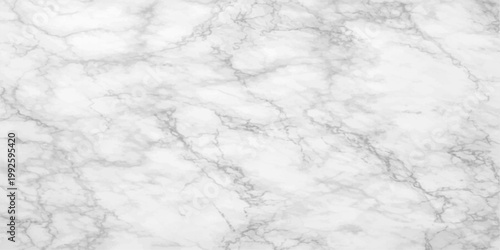 An abstract grunge white marble texture blends with a cold winter sky and snowy nature patterns to create a beautiful light blue cloudscape background