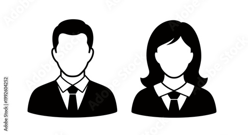 Two business professionals standing side by side in formal attire.