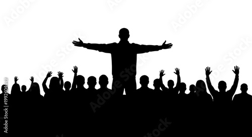 Silhouette of a man standing with arms outstretched among a crowd of people.