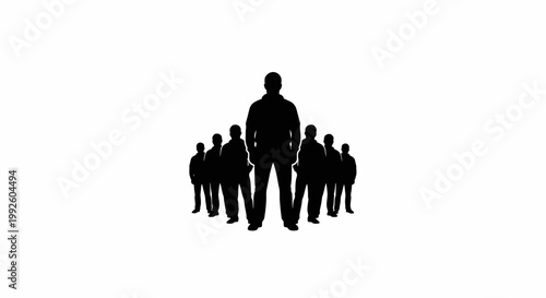Silhouette of a large man standing with a group of people.