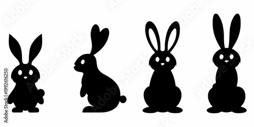 Four black silhouettes of rabbits in various poses against white