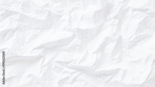 Crumpled white paper texture background with creases and folds