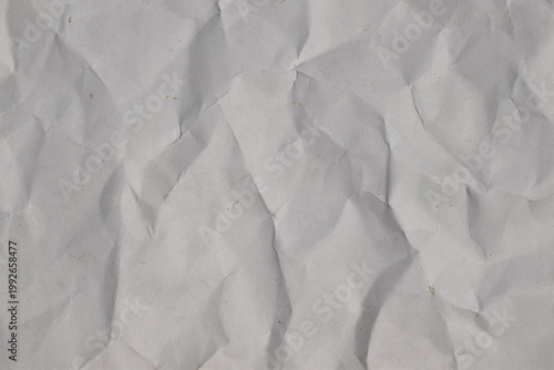 White crumpled paper texture background, top view. 