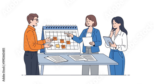 Business people discussing calendar schedule.