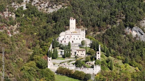 Aerial view of Castello di Avio, Italy. Medieval fortress and architectural landmark in European travel destination.