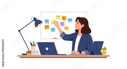 woman working on laptop with sticky notes.