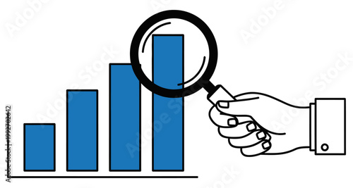Hand holding magnifying glass over rising bar chart during analysis