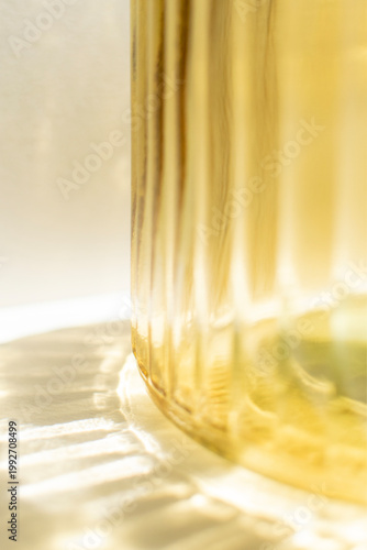 Amber glass vase ribbed texture close up minimal home decor abstract background for wall art print poster mockup branding template modern neutral interior aesthetic luxury design composition