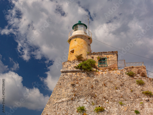 Lighthouse on rocky hillside in Corfu, Greece