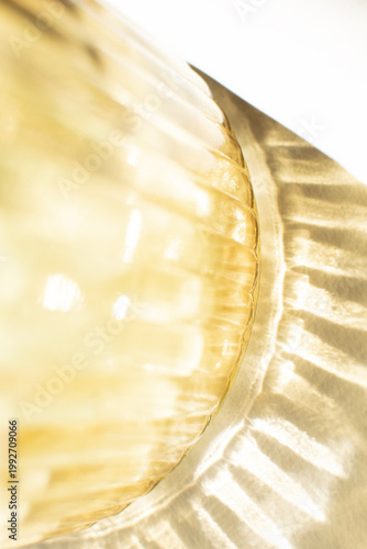 Amber glass vase bottom detail with radial reflections abstract texture modern minimal design background for wall art print poster mockup branding template decorative composition
