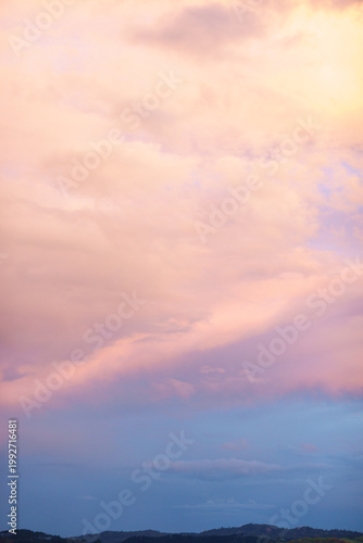 Minimalist dreamy pink sunset cloudscape for atmospheric background