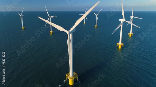 Harnessing the Breeze: A cluster of massive wind turbines stands tall in the tranquil waters, diligently converting the gentle breeze into renewable energy. Generative AI.