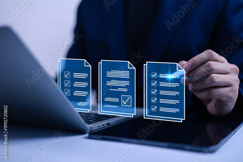 Document management and checklist approval concept with businessman using laptop, digital files verification, workflow process, business audit, compliance control and online task management system