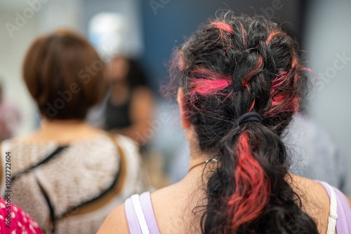 Rear view of woman with colored hair