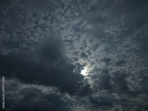 Sunlight Breaking Through Dramatic Dark Clouds