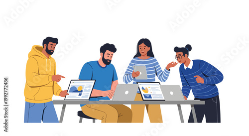 Team of diverse professionals working on laptops and tablets during meeting or collaboration