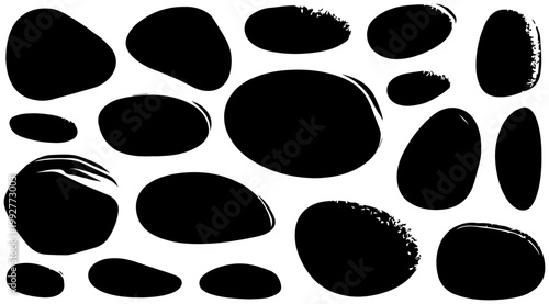 Collection of diverse black abstract organic shapes and smooth rounded pebble silhouettes with textured and clean edges isolated on a white background representing natural