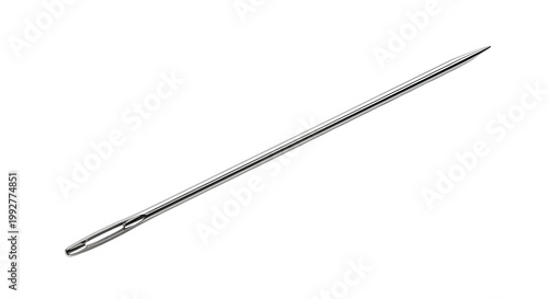 Closeup of a shiny metal sewing needle on white background