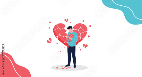 Sad young man standing in front of a giant cracked heart while holding a small broken piece of his own heart representing heartbreak.