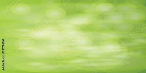 Green abstract background with white spots and blurry texture