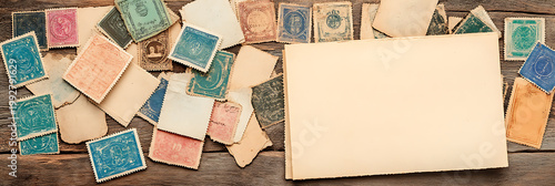 stack of old books on wooden table