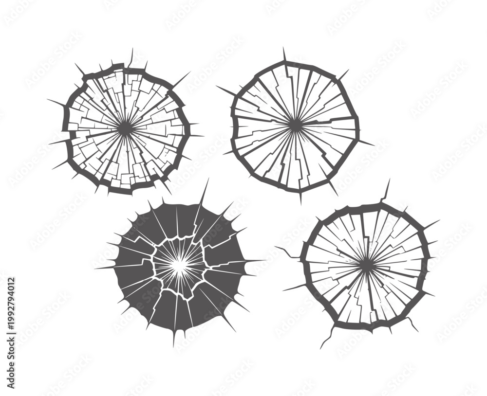 Obraz premium Four dark grey circular shattered glass effects white broken crack impact