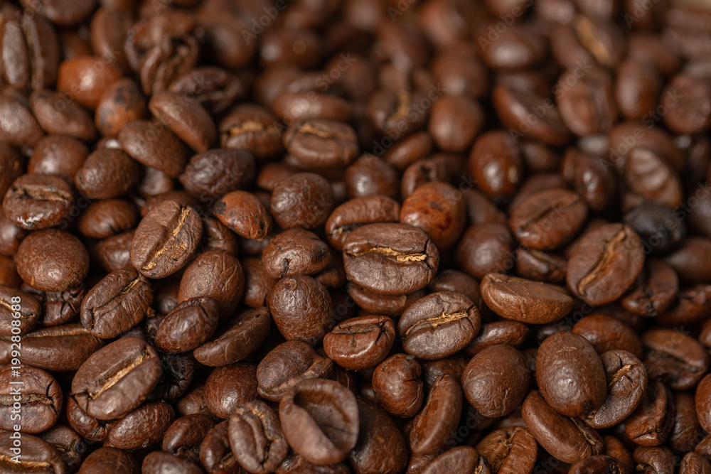 Fototapeta premium Close-up of freshly roasted coffee beans background