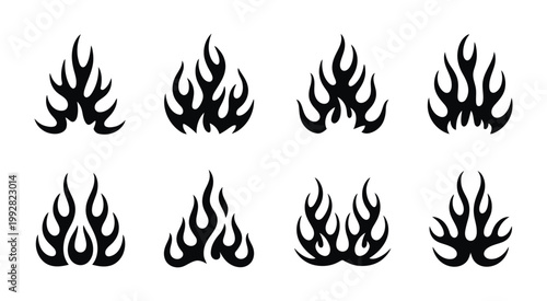 Abstract black flame vector set, tribal style fire elements, clean silhouette shapes with smooth curves and sharp tips, isolated on white background for graphic design, custom artwork, and pattern.