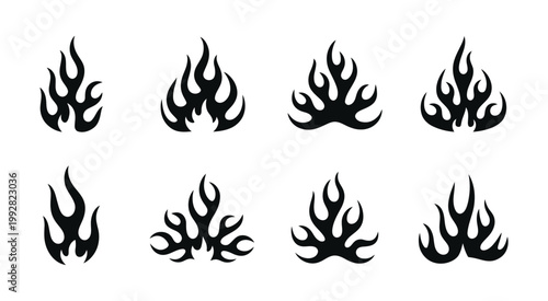 Abstract black flame vector set, tribal style fire elements, clean silhouette shapes with smooth curves and sharp tips, isolated on white background for graphic design, custom artwork, and pattern.