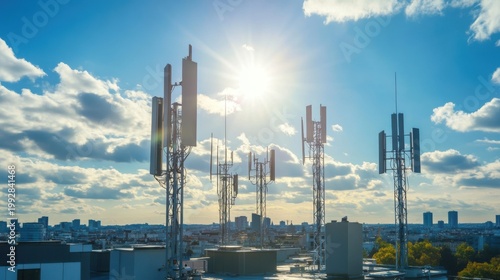 Modern Telecommunication Antennas on Rooftops Under Bright Sky