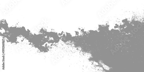 Abstract gray paint spray texture on white background with fragmented edges for grunge and artistic design