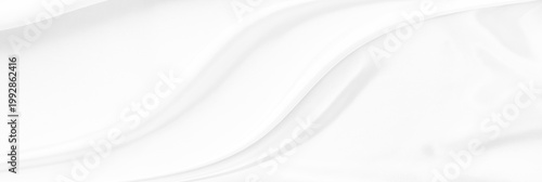 White gray satin texture that is white silver fabric silk panorama background with beautiful soft blur pattern natural.