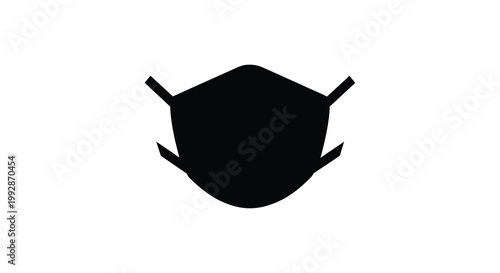 A stark black silhouette depicts a disposable face mask representing health safety and protection measures high quality professional