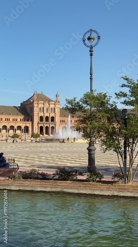 Seville - Spain. 21 April 2026.Plaza de España curves around a grand semicircular palace, its canals, bridges, and tiled alcoves showcasing Seville’s architectural splendor.